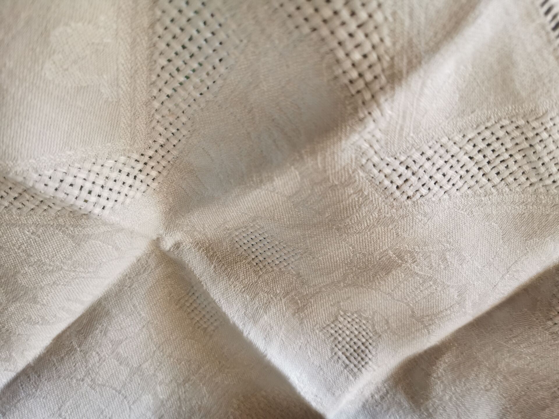 Set of 16 table napkins and an old floral damask tablecloth.