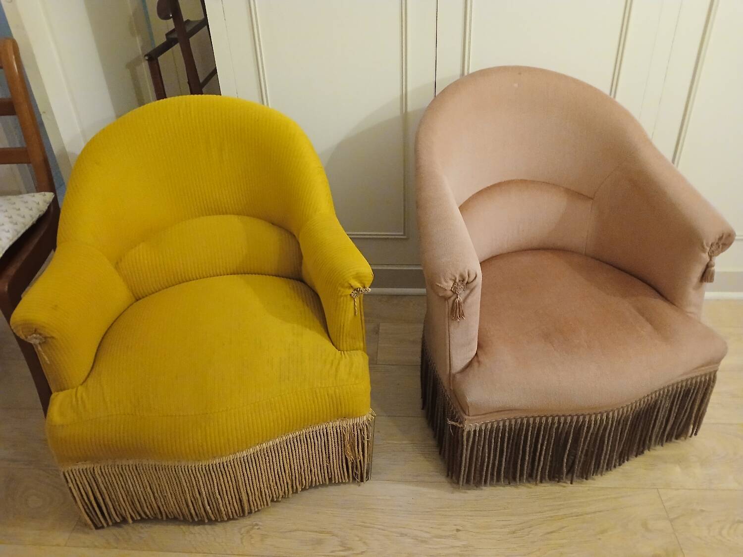 Set of 2 yellow and pink velvet tub chairs.