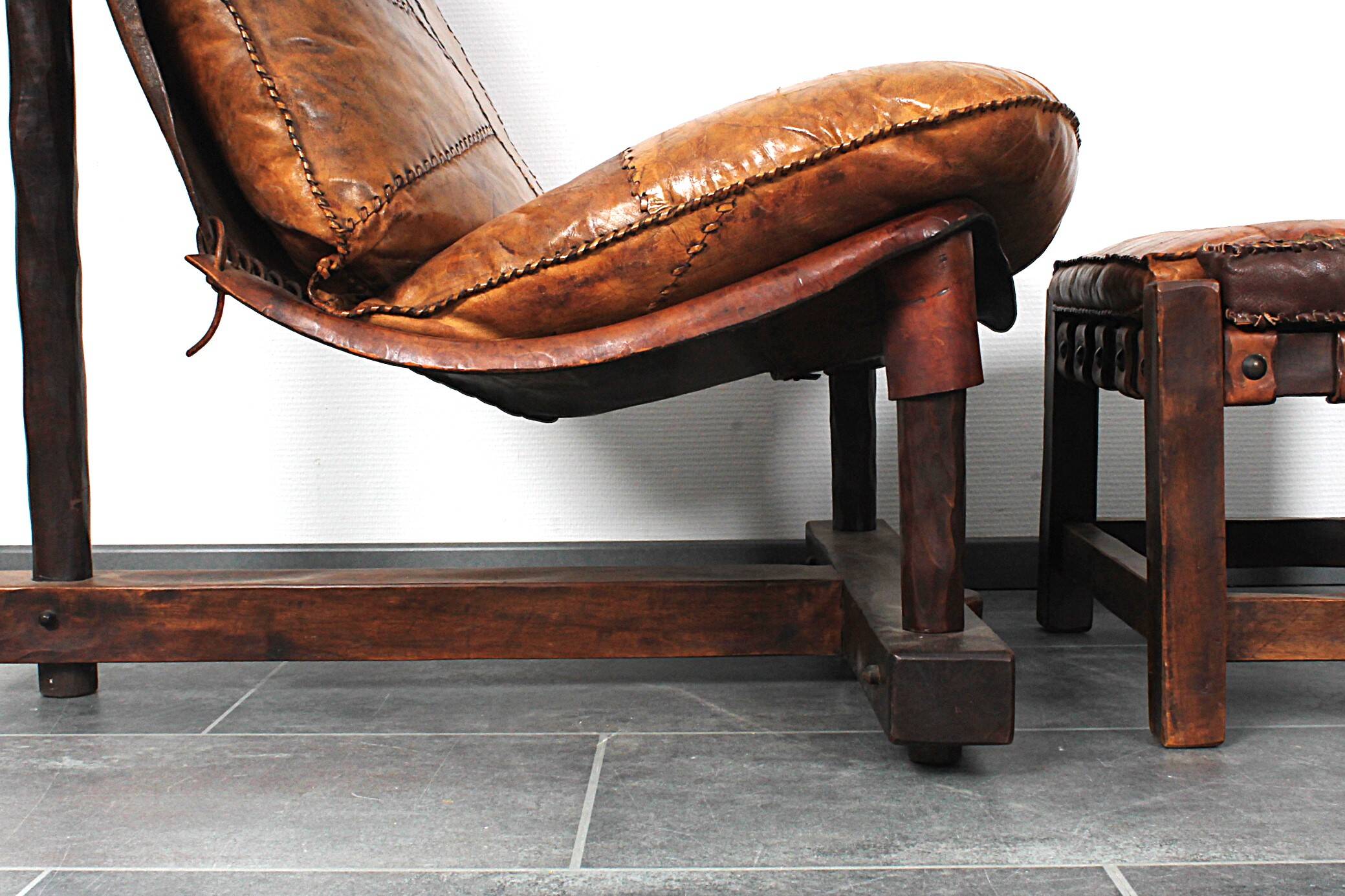 Brutalist oak lounge chair and ottoman, 1970s, set of 2