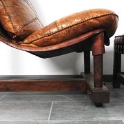 Brutalist oak lounge chair and ottoman, 1970s, set of 2