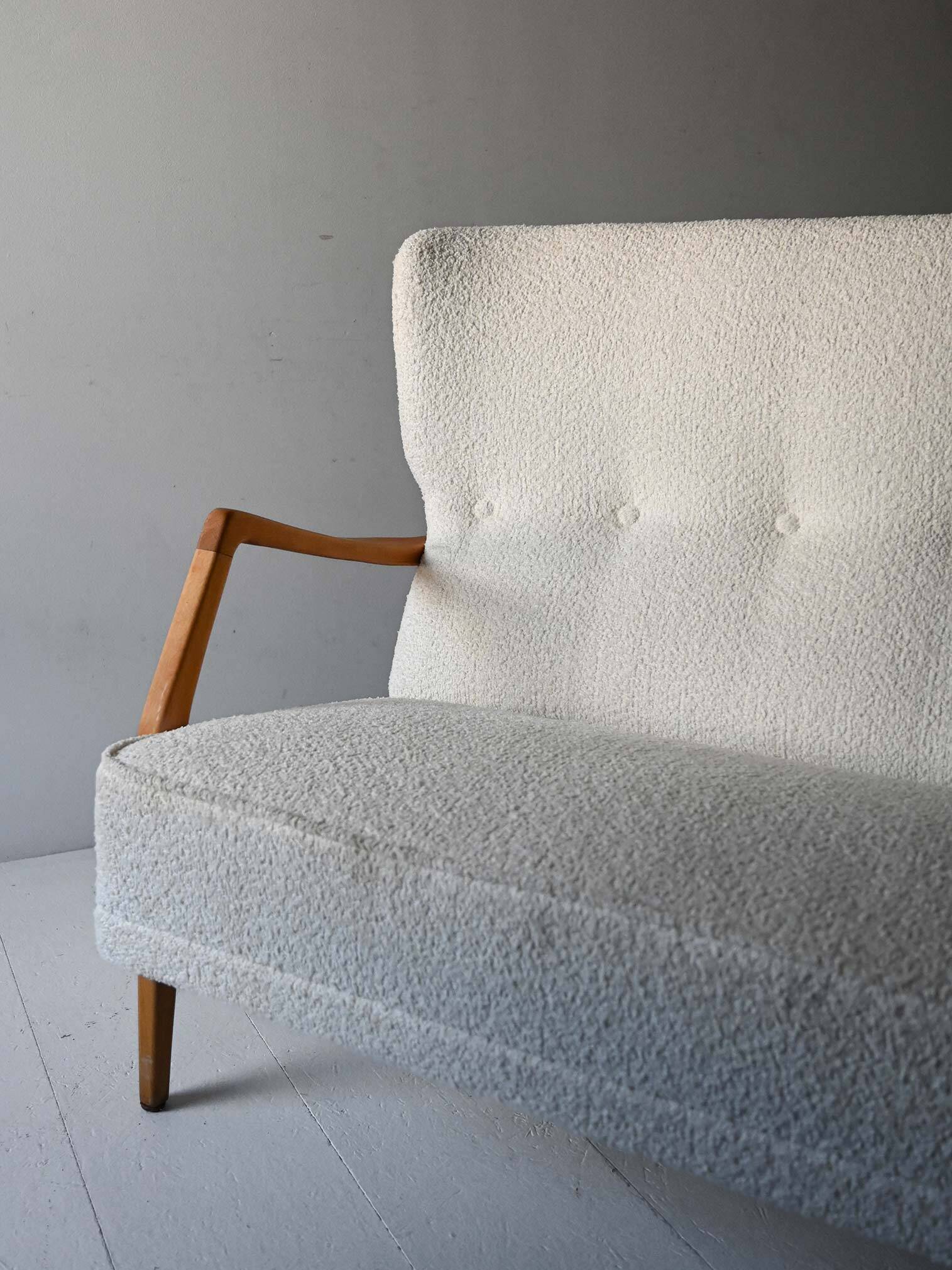 Vintage Scandinavian sofa with faux lambskin