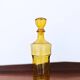 Set of two vintage amber glass carafes attributed to Lubiana.