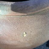 Old jug with two sandstone handles