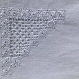 Rectangular tablecloth with embroidered openwork pattern