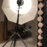 Napoleon III curved mirror, blackened wood frame with cream trim