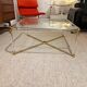Coffee table and its 4 associated nesting tables in plexiglass and gold metal