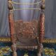 Chaise basse afghane en bois sculpté
