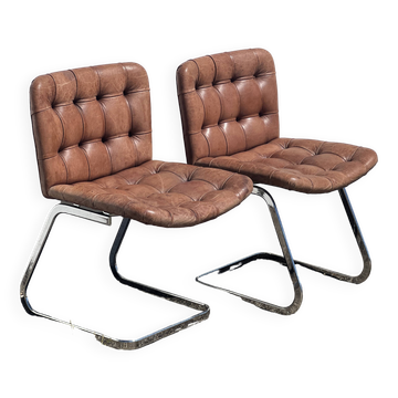 Paire de chaises en cuir par Robert Haussman