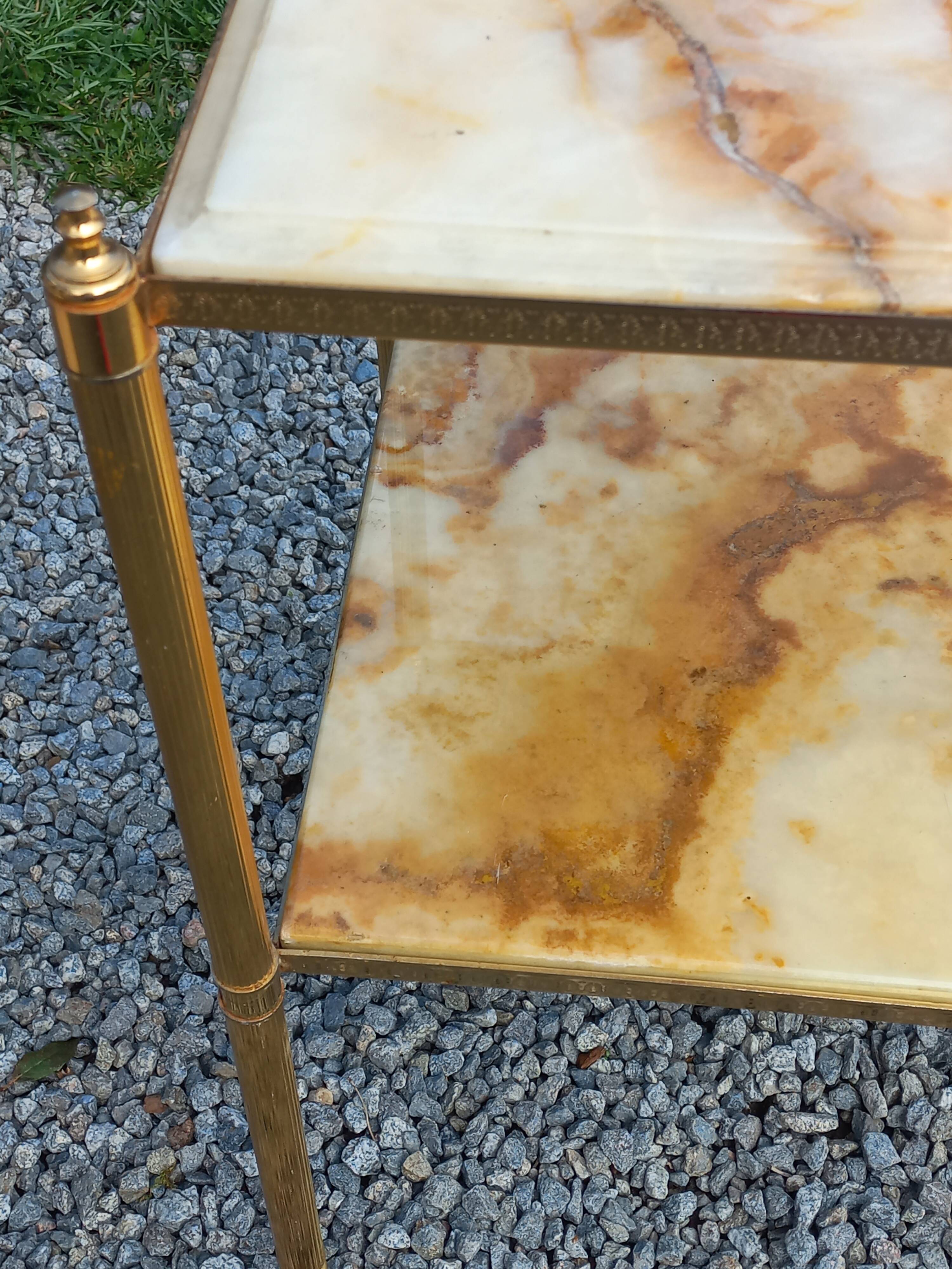 Pair of neoclassical side tables in bronze, brass, marble, and o.