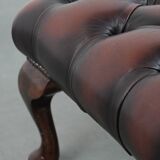 Dark brown chesterfield ottoman in cowhide leather