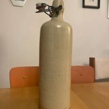 Old stoneware bottle vase