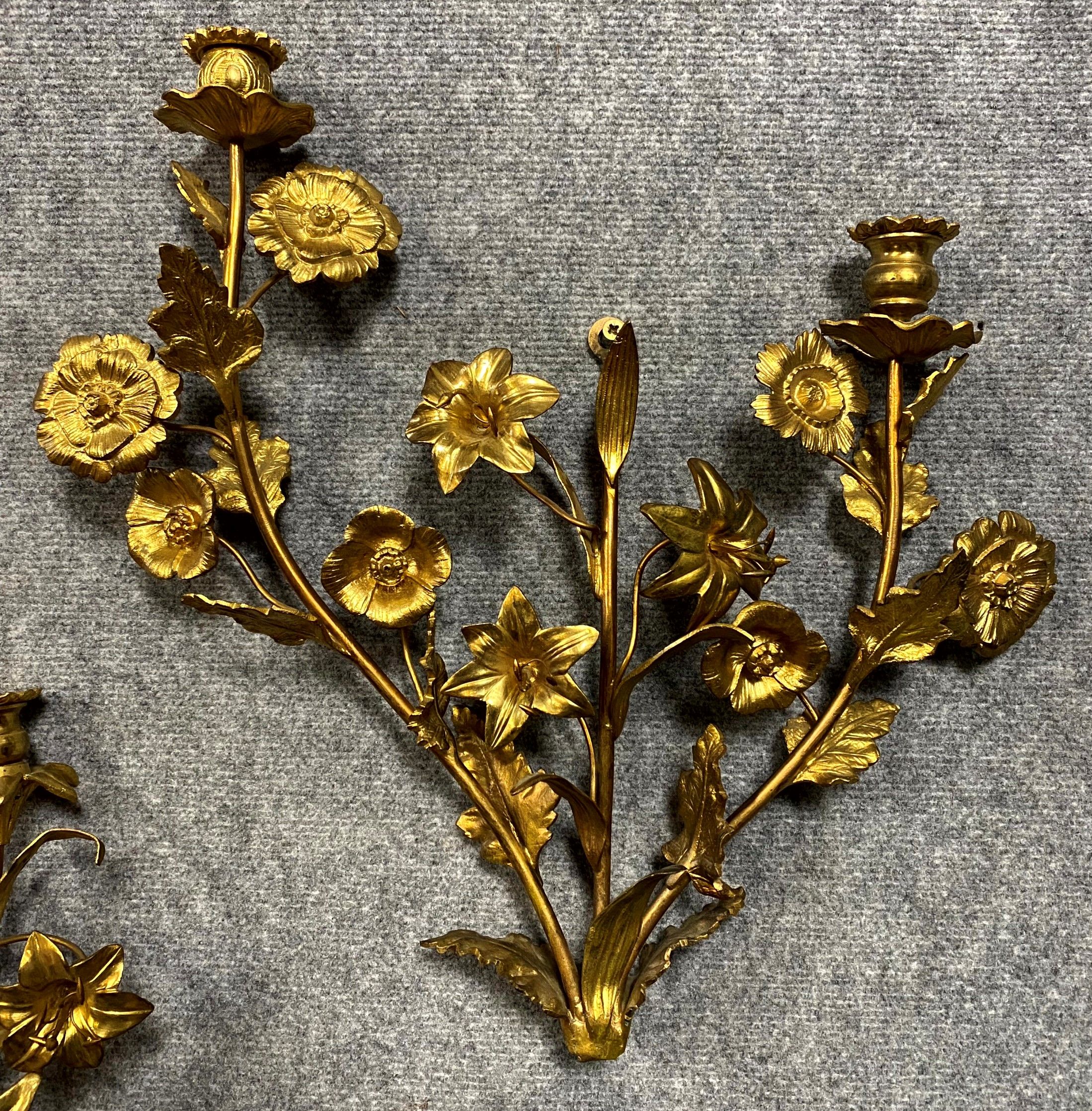 Triptych of gilded bronze sconces decorated with flowers Napoleon III period