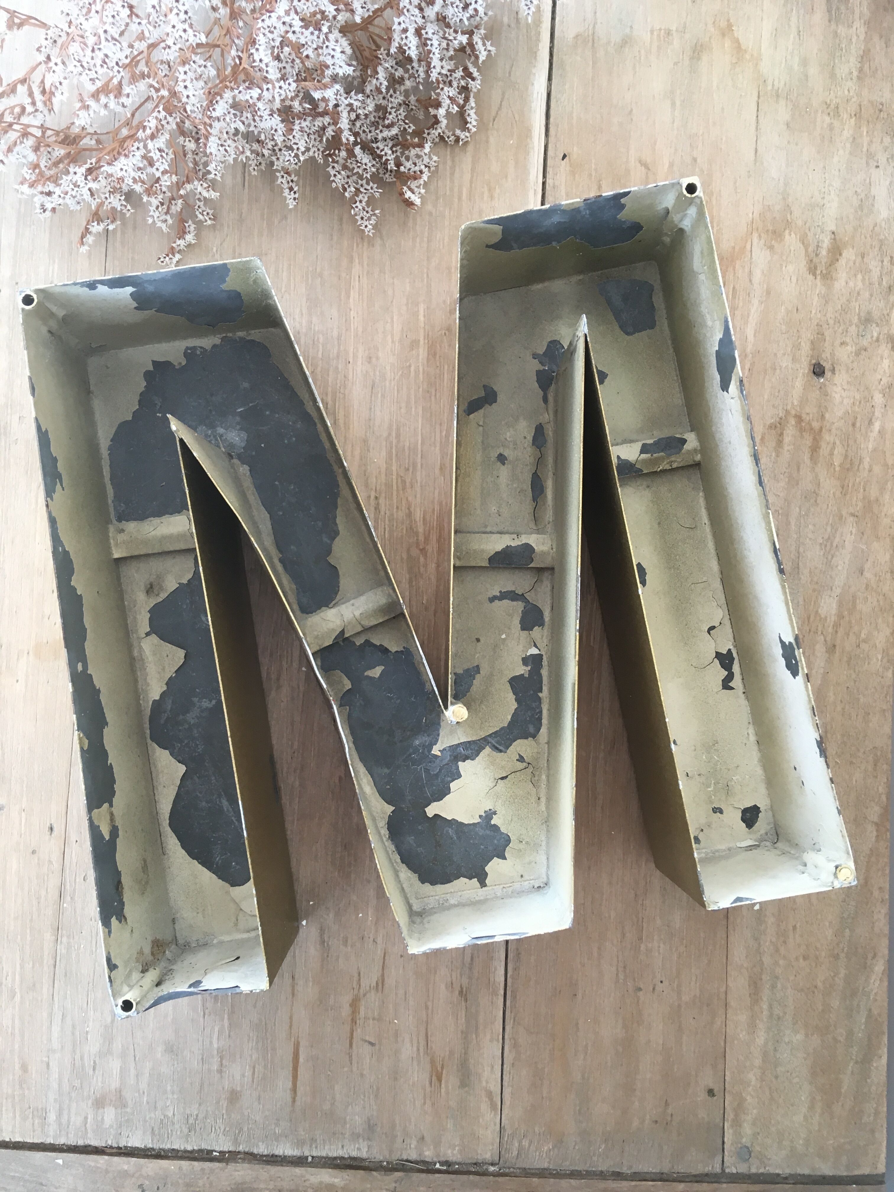 Golden vintage sign letter M