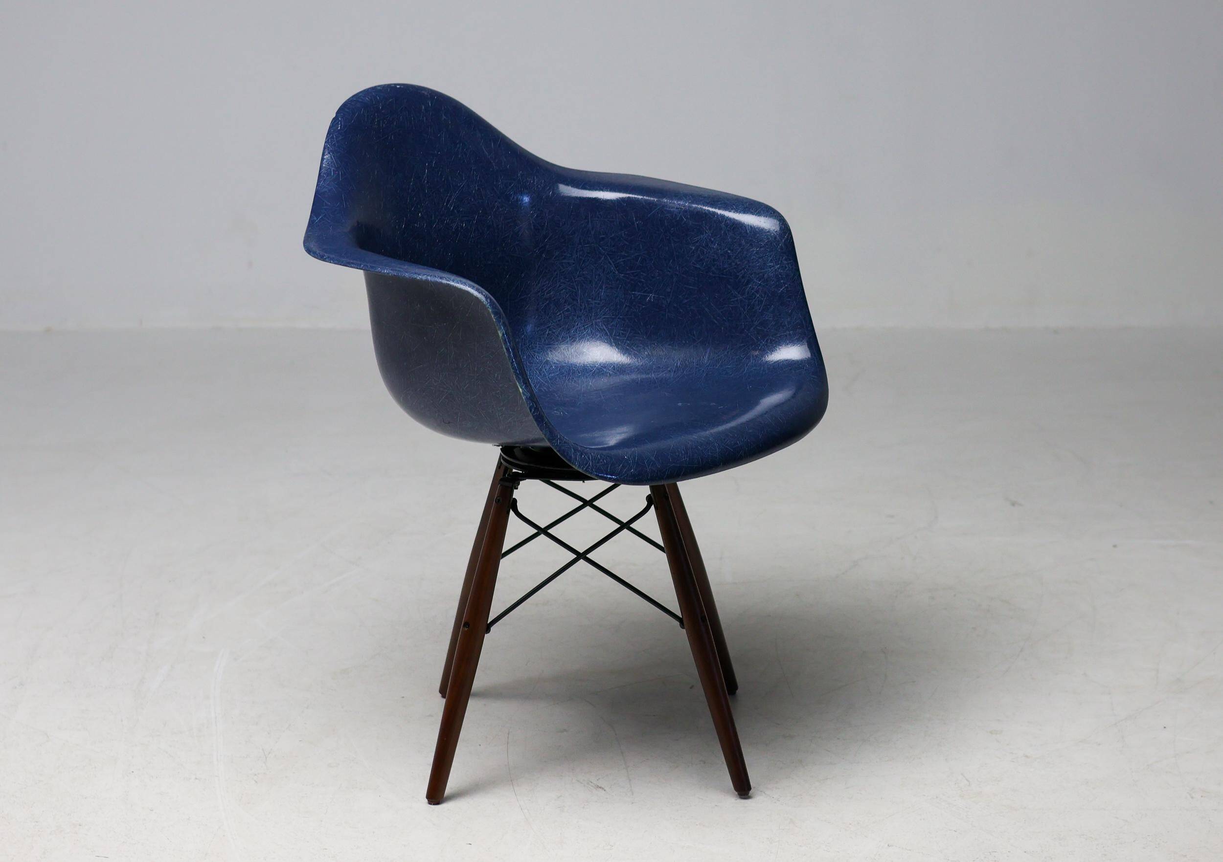 Indigo blue Charles Eames "PAW" armchair by Herman Miller, mid-century modern.