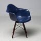 Indigo blue Charles Eames "PAW" armchair by Herman Miller, mid-century modern.