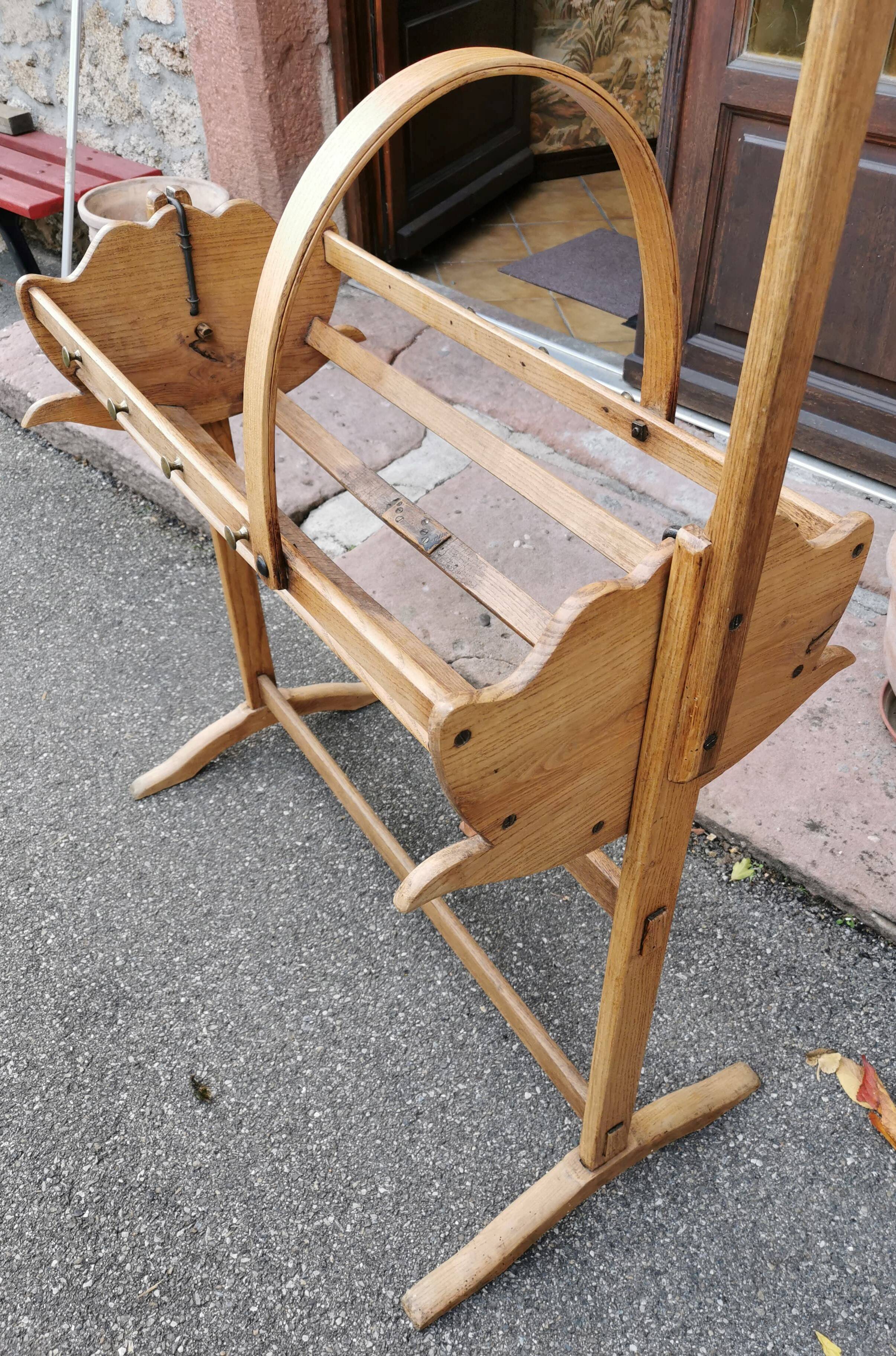 Old cradle with solid oak canopy