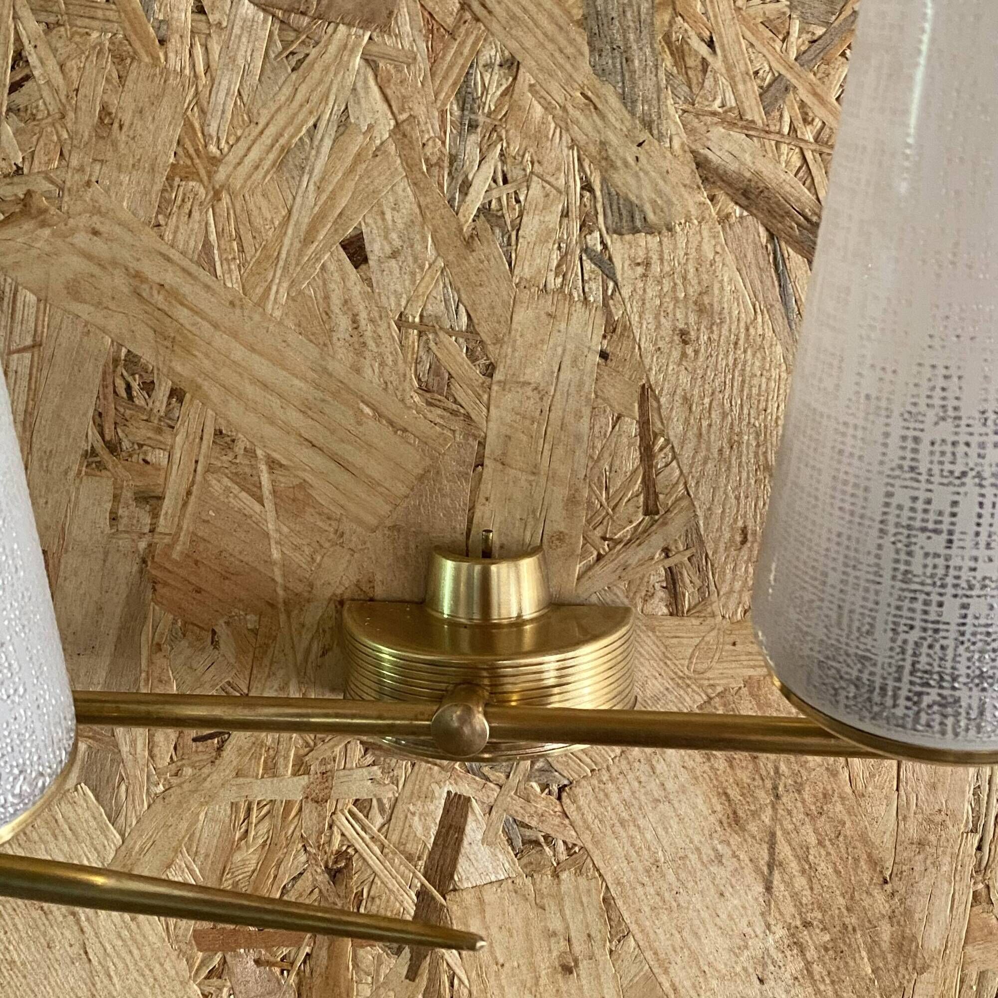 Pair of vintage double wall lights in brass with white ribbed glass tulips.