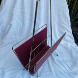 Vintage magazine rack in red skai with gold metal frame and plastic handle