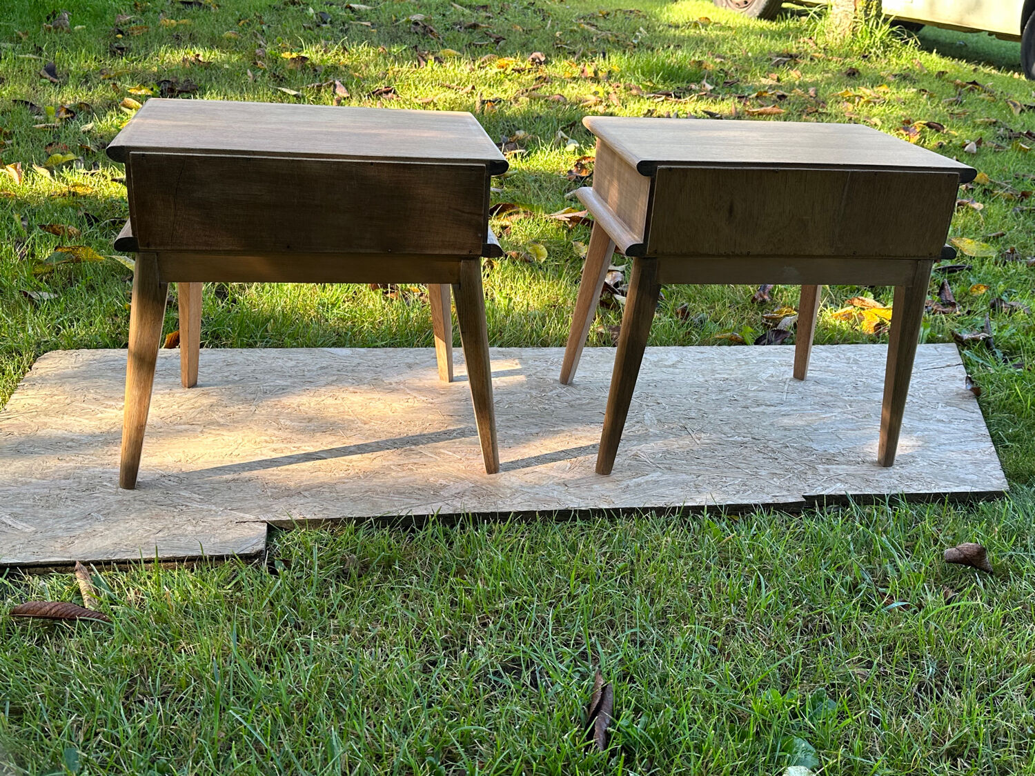 Vintage bedside tables with compass feet