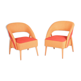Mid century red and orange chairs. made in 1940