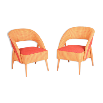 Mid century red and orange chairs. made in 1940