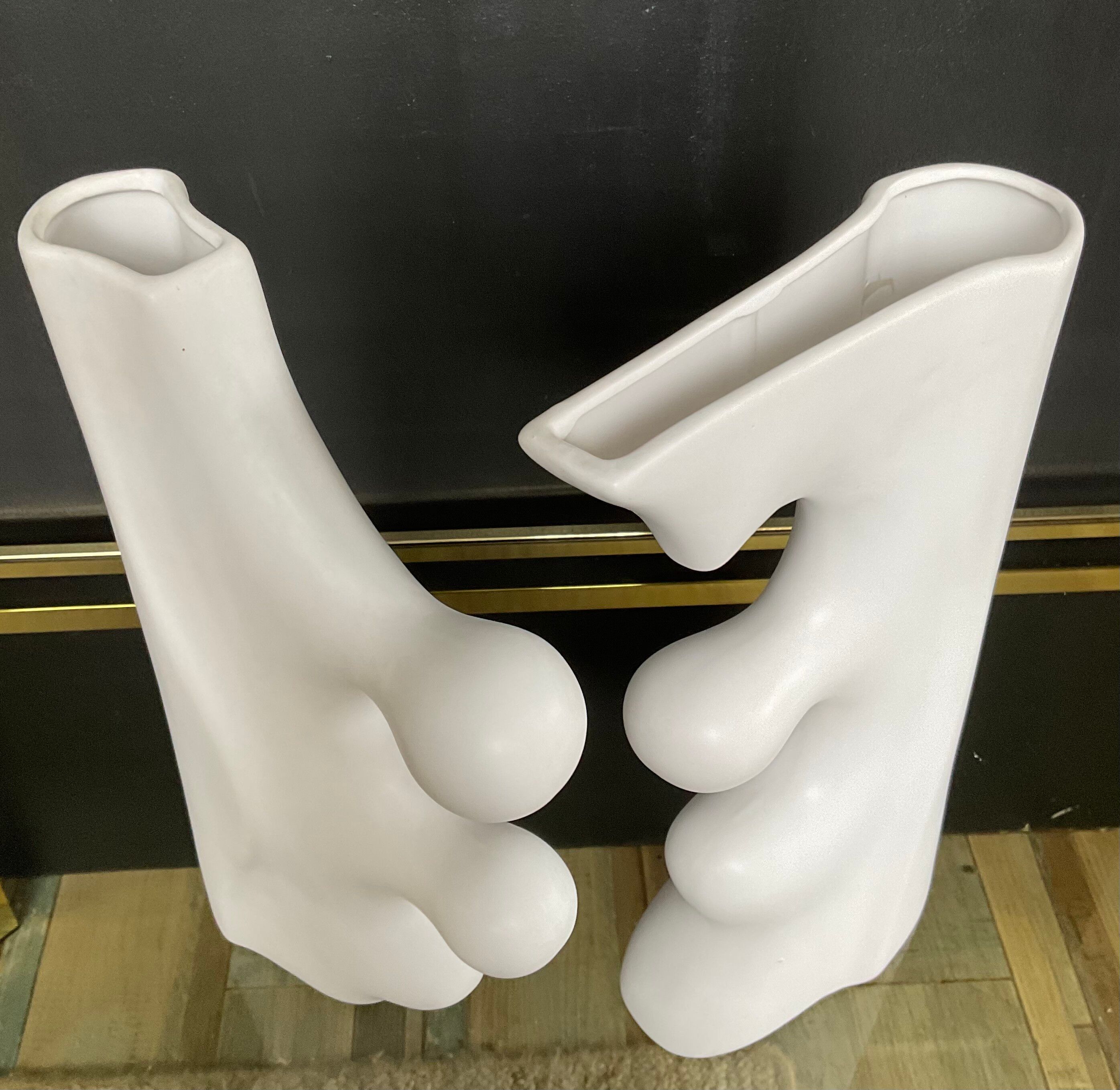 A pair of large designer ceramic vases.