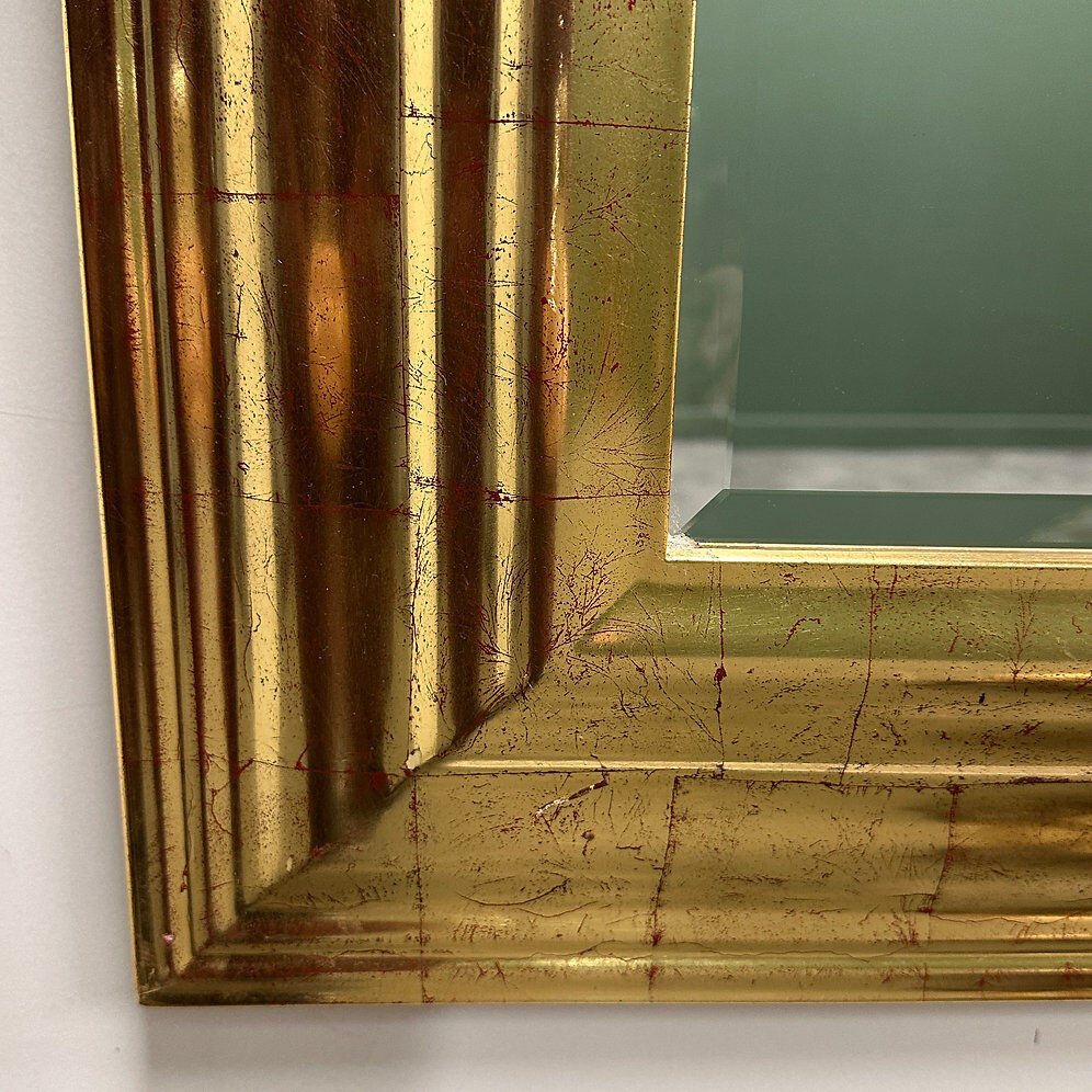 Very large Deknudt mirror with faux gold leaf frame, 1980s. Belgium