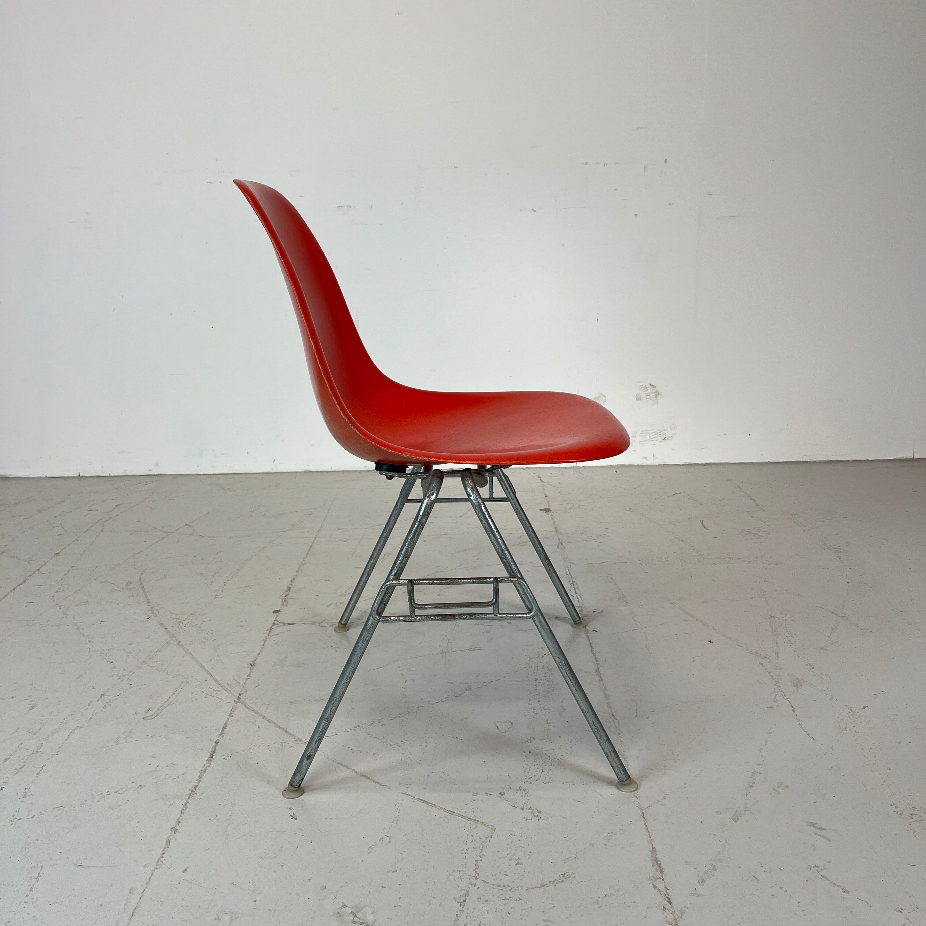 Vintage Eames Herman Miller DSS side chairs in coral orange