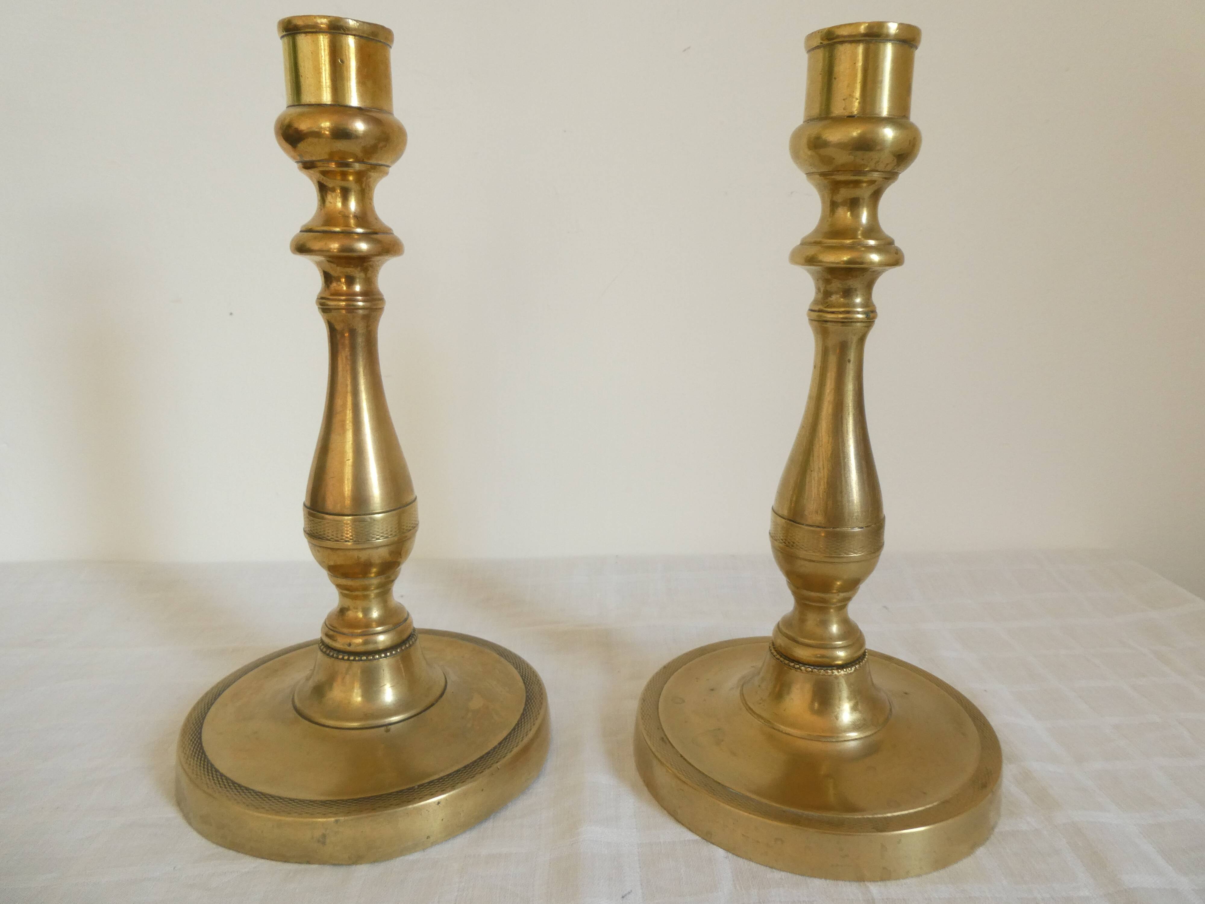 Pair of bronze candlesticks from the Restoration period, circa 1820