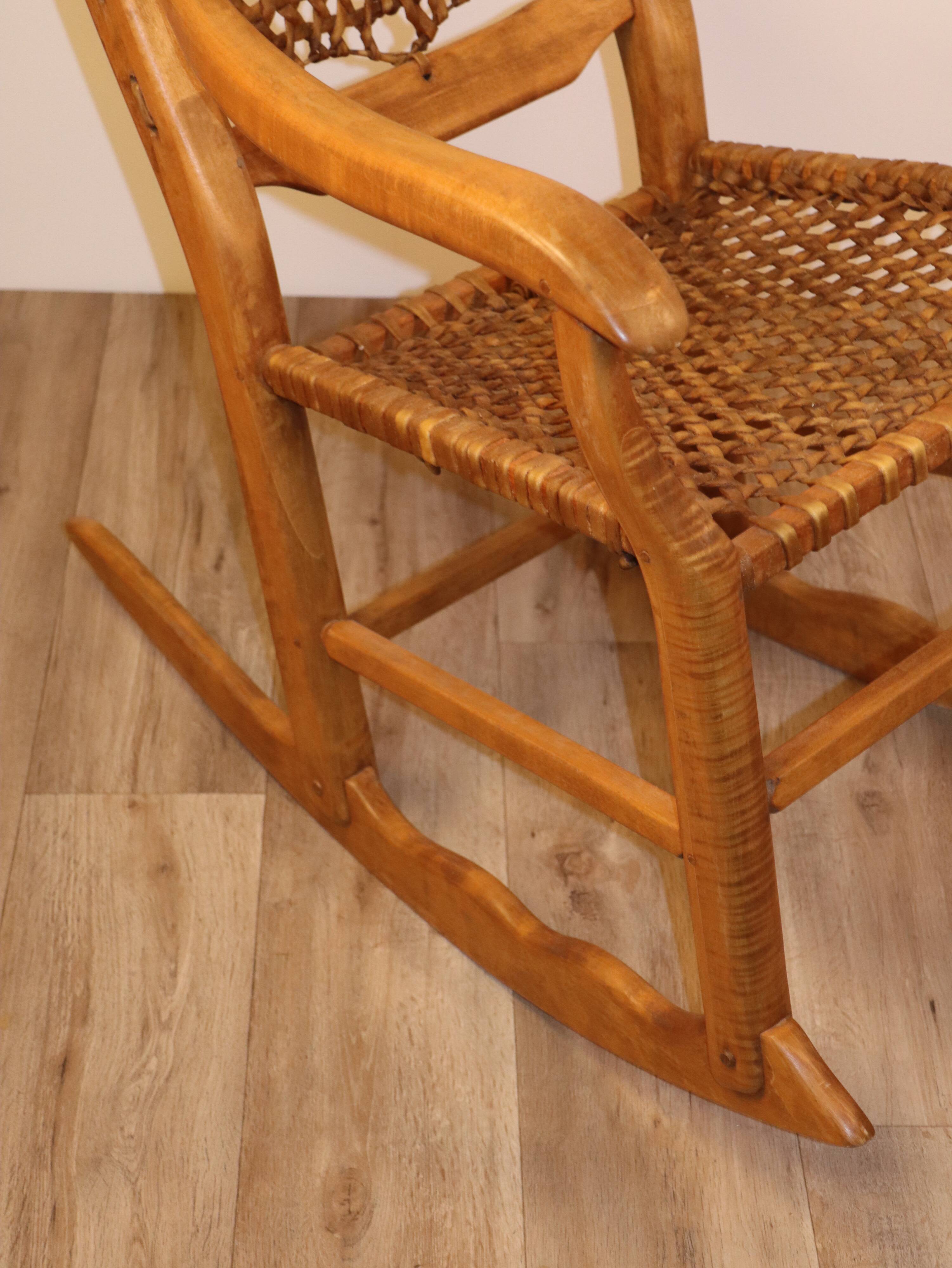 Vintage rocking chair in solid wood 1950