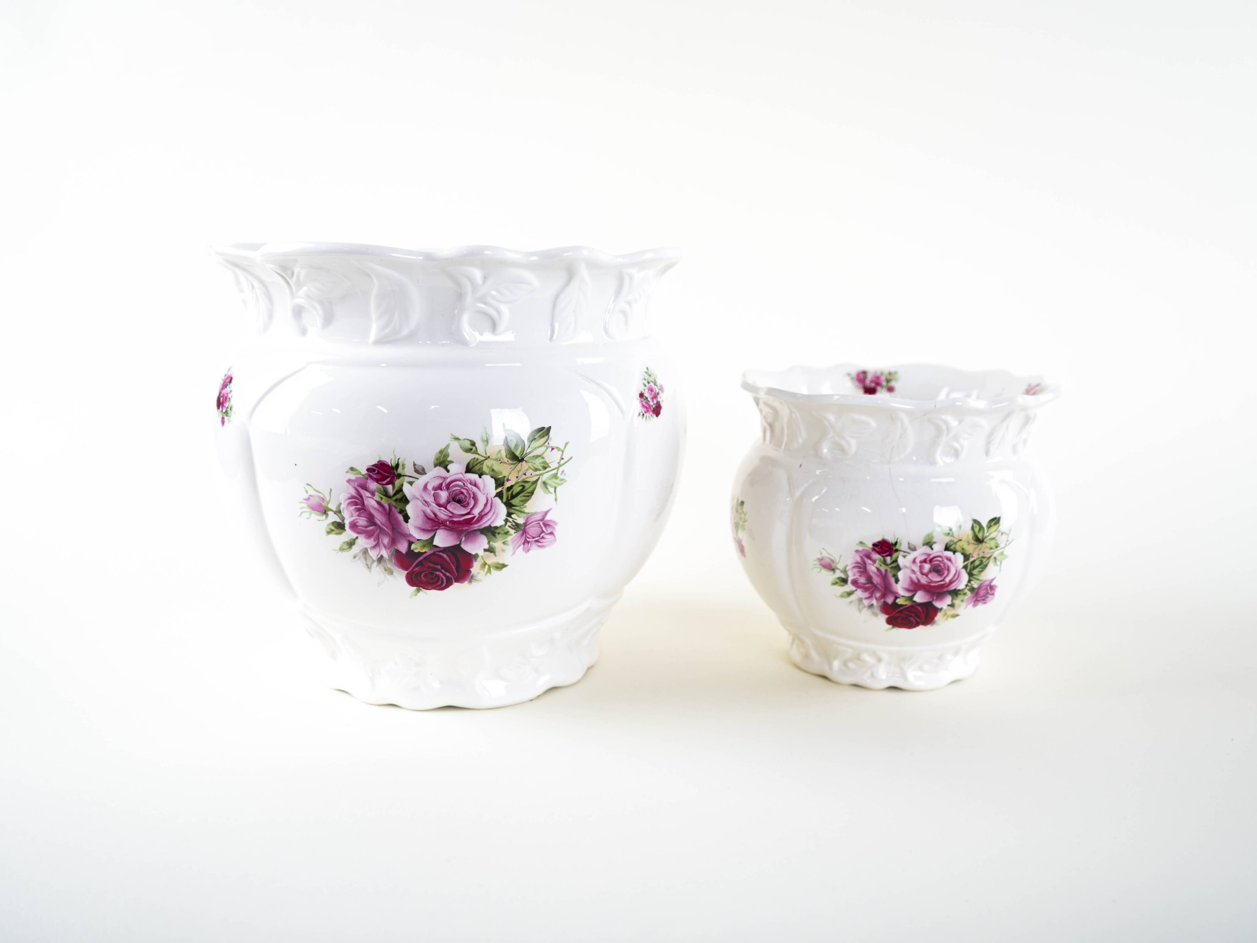 Pair of decorative ceramic vases with hand-painted roses, Art Deco style, European