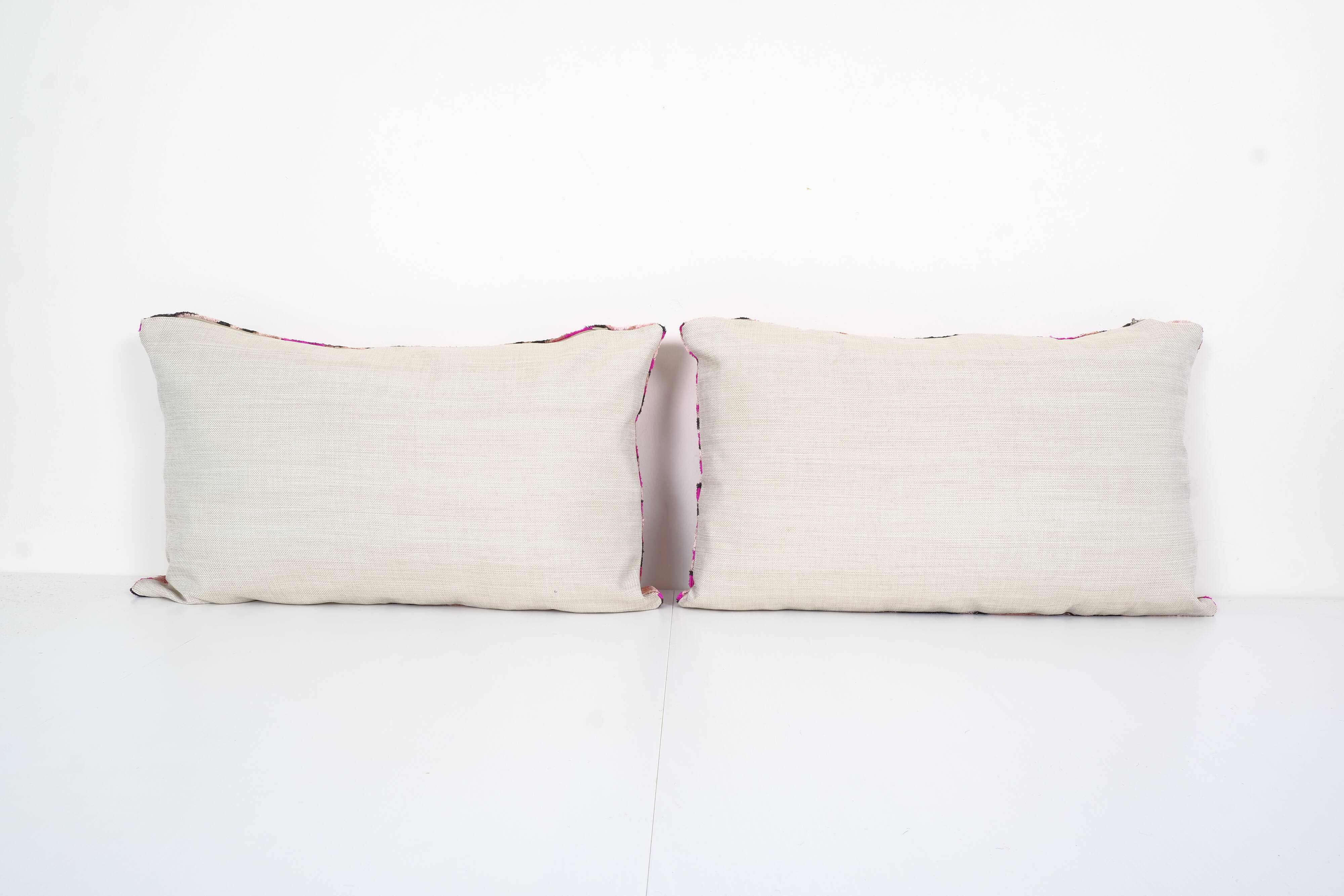 Matching silk ikat velvet pillows