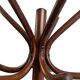 Vintage coat rack on floor in curved wood, thonet style
