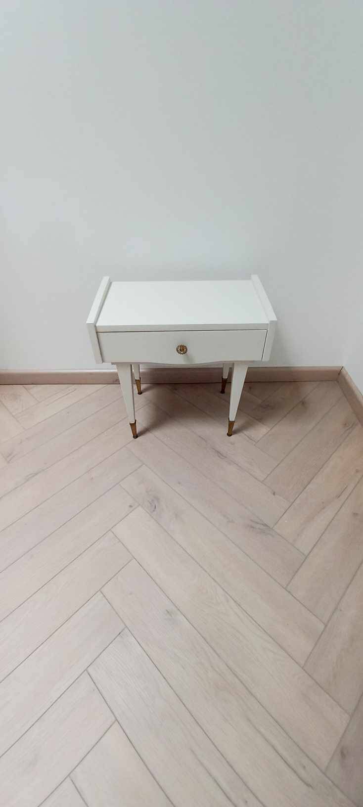 Vintage bedside table with compass foot