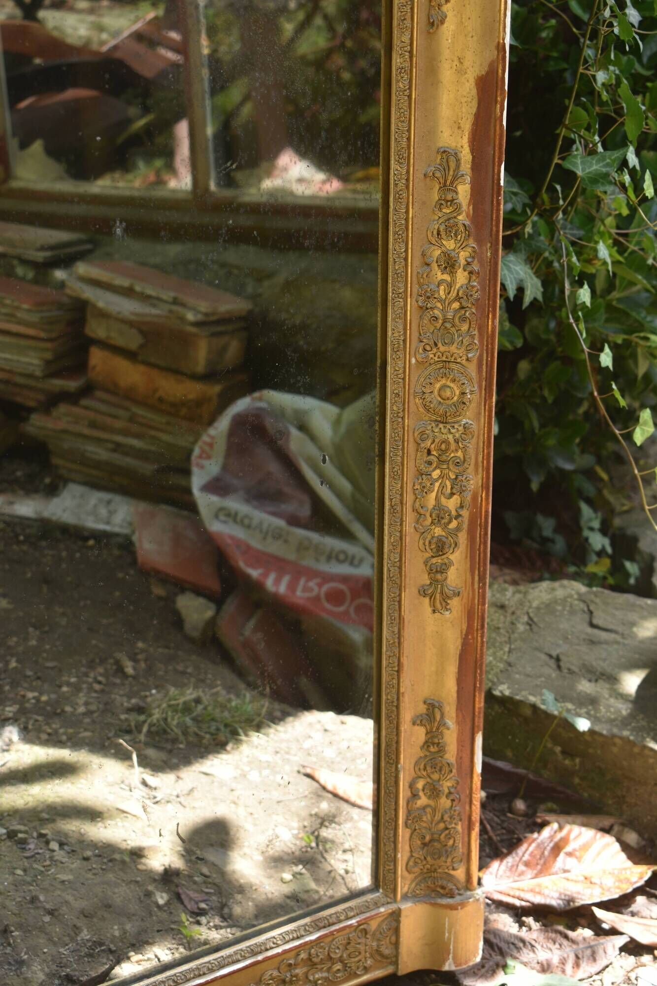 Large gilded Empire mirror from the 19th century.