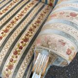 2 Louis XVI bergère armchairs in solid wood with beige and blue embroidered fabric.