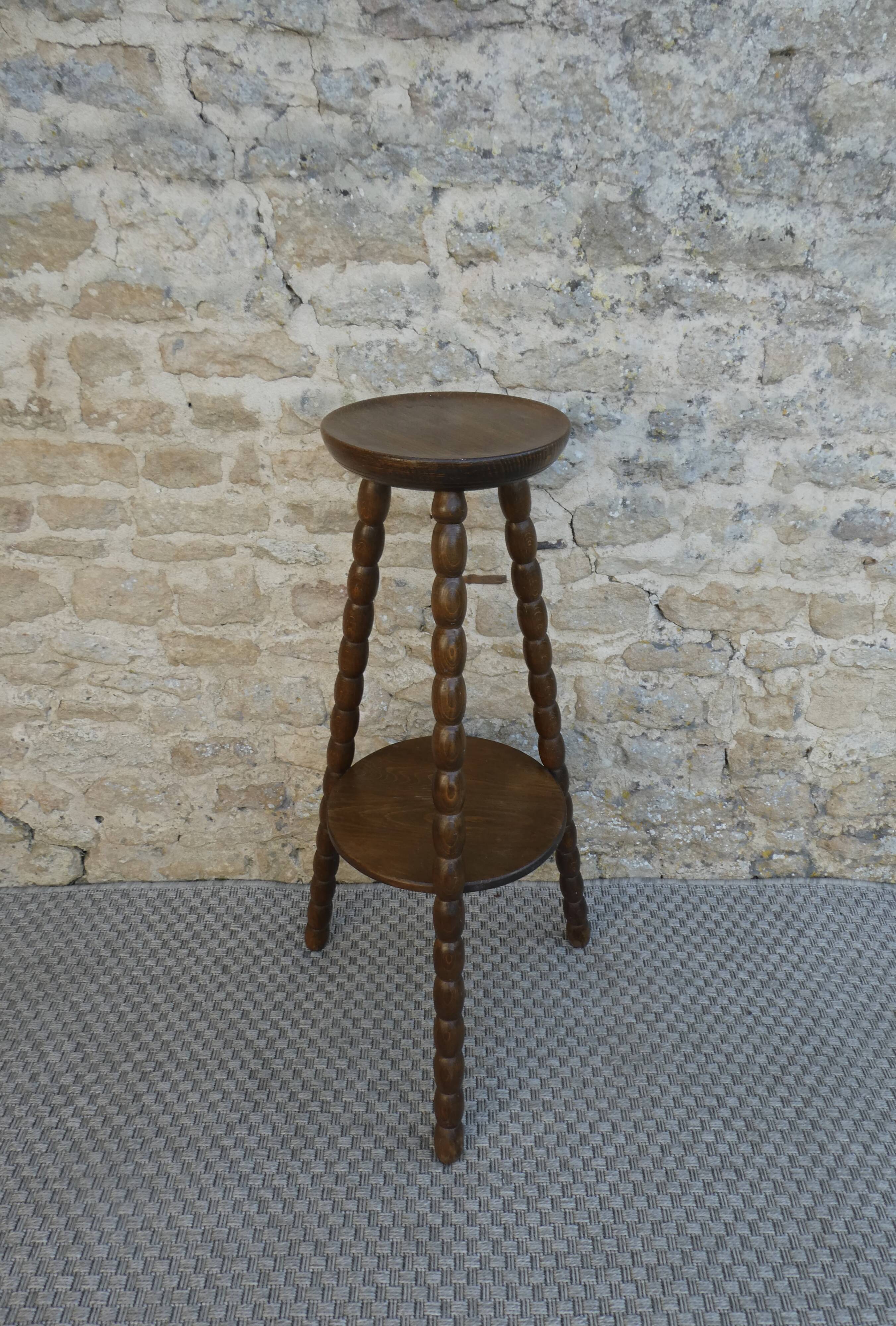 Turned wooden tripod stand