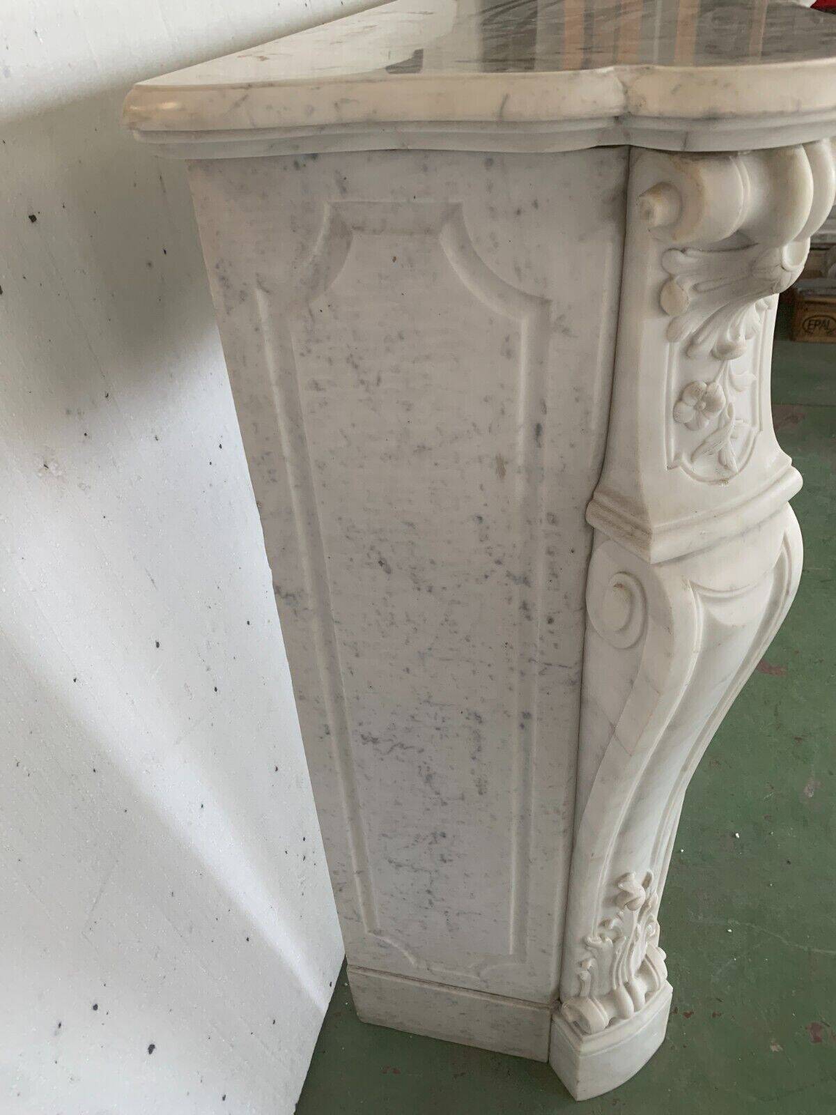 Louis XV style fireplace in white Carrara marble 19th century
