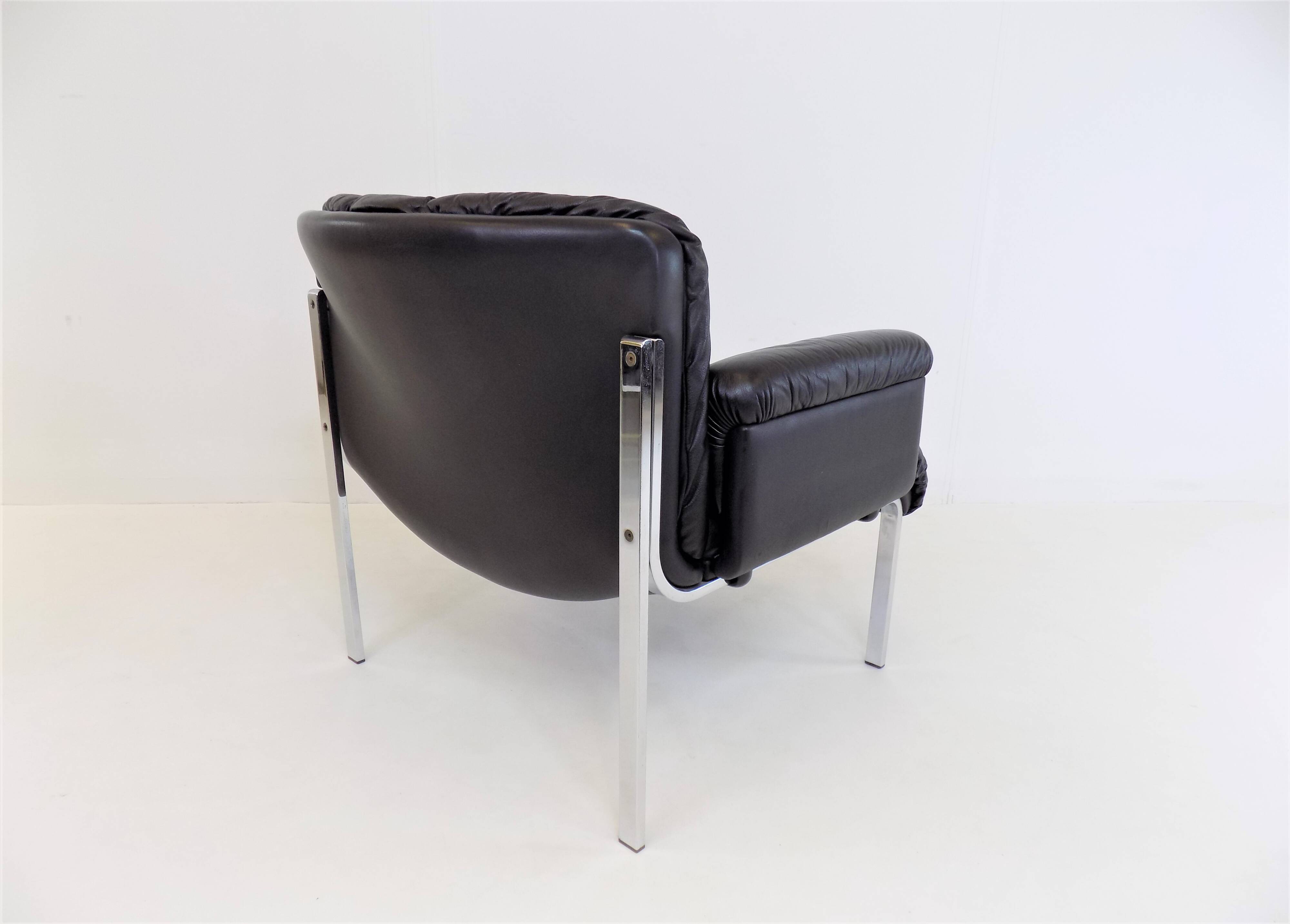 Set of 2 Girsberger Eurochair leather armchairs