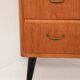 Scandinavian teak chest of drawers with black legs