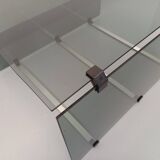 Vintage coffee table in smoked glass, black metal and cast aluminum