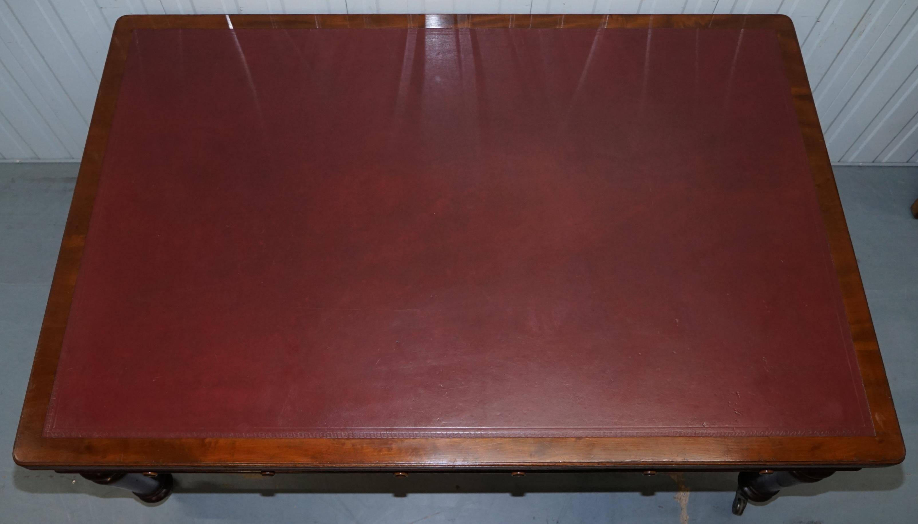 Rare double-sided desk in hardwood by Holland and Sons, Victorian era.