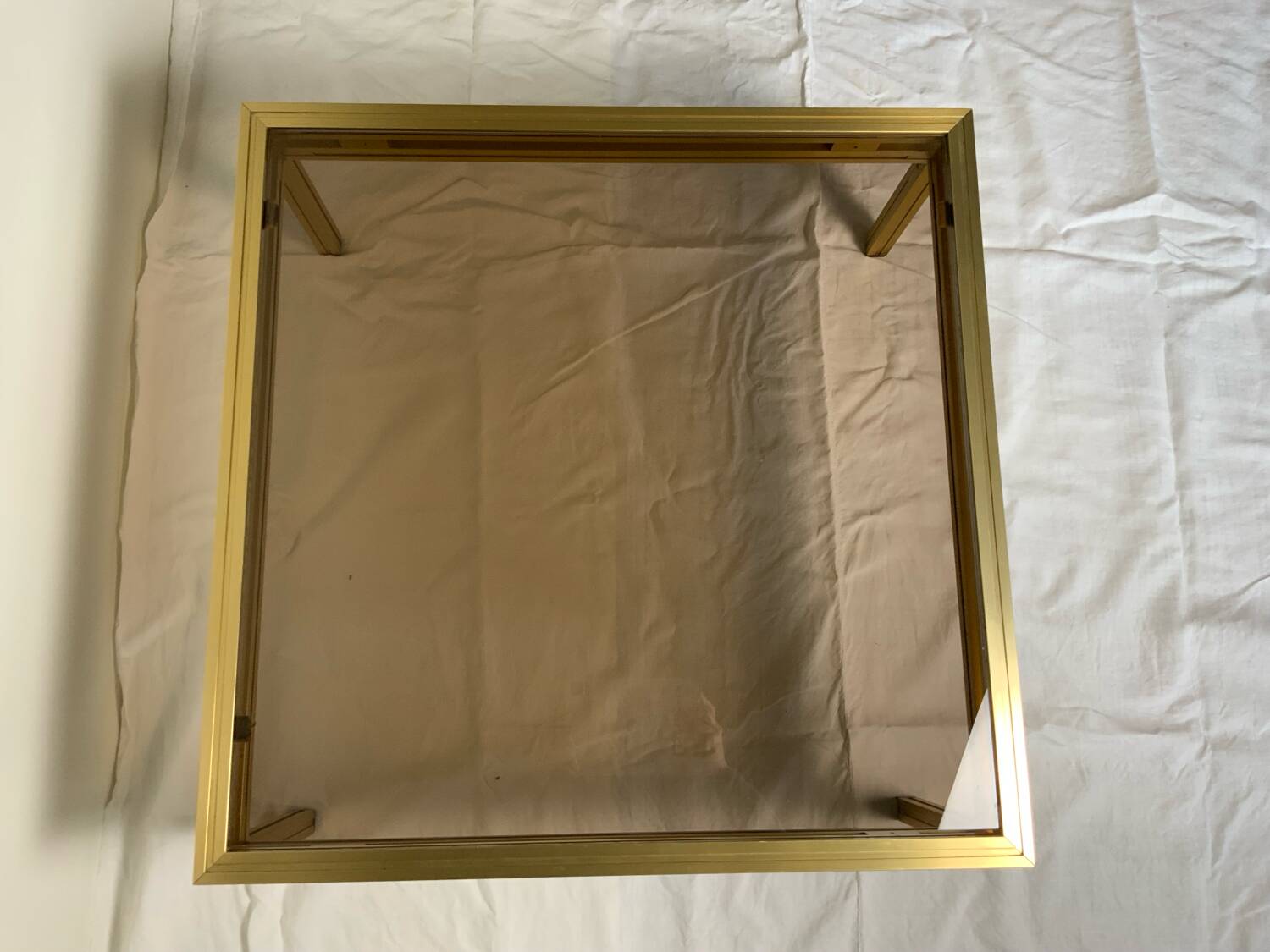 Glass and brass coffee table