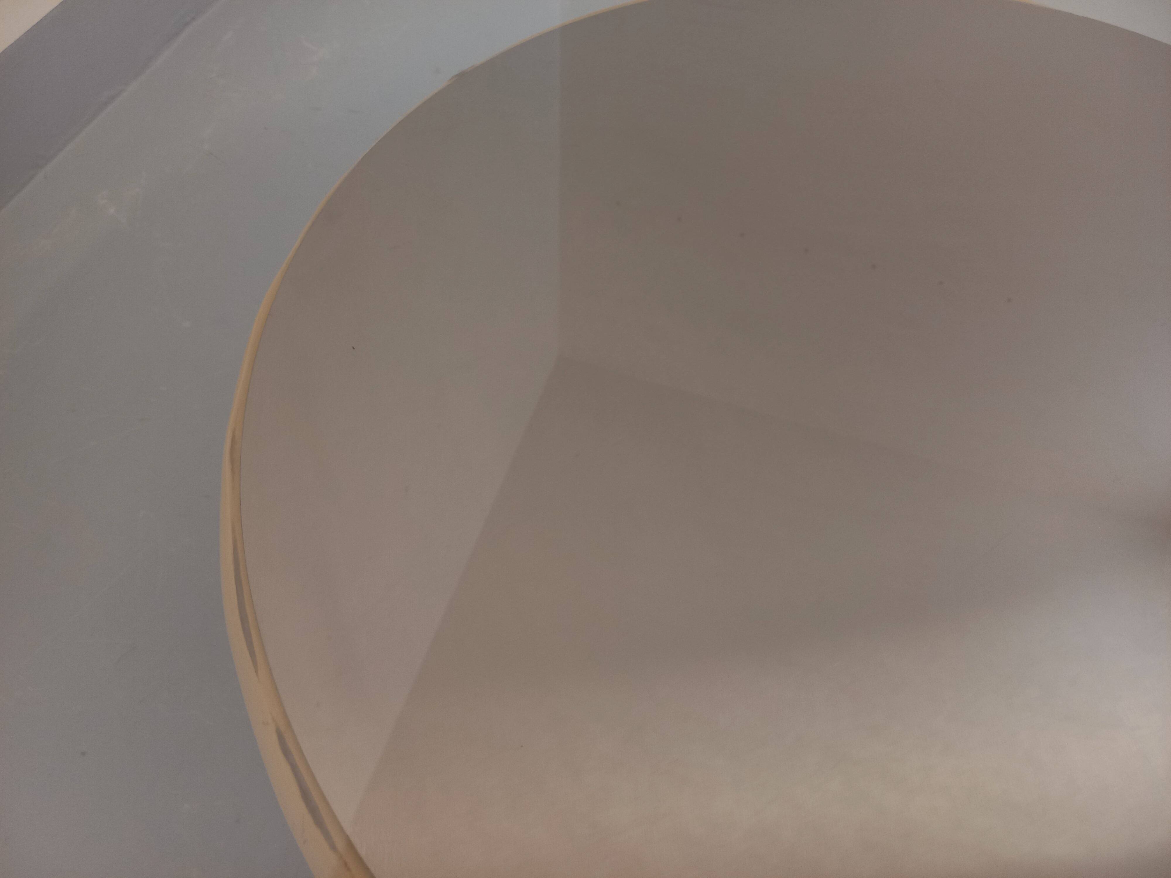 Vintage round coffee table in glass, leather, and metal in Space Age style from the 70s.