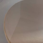 Vintage round coffee table in glass, leather, and metal in Space Age style from the 70s.