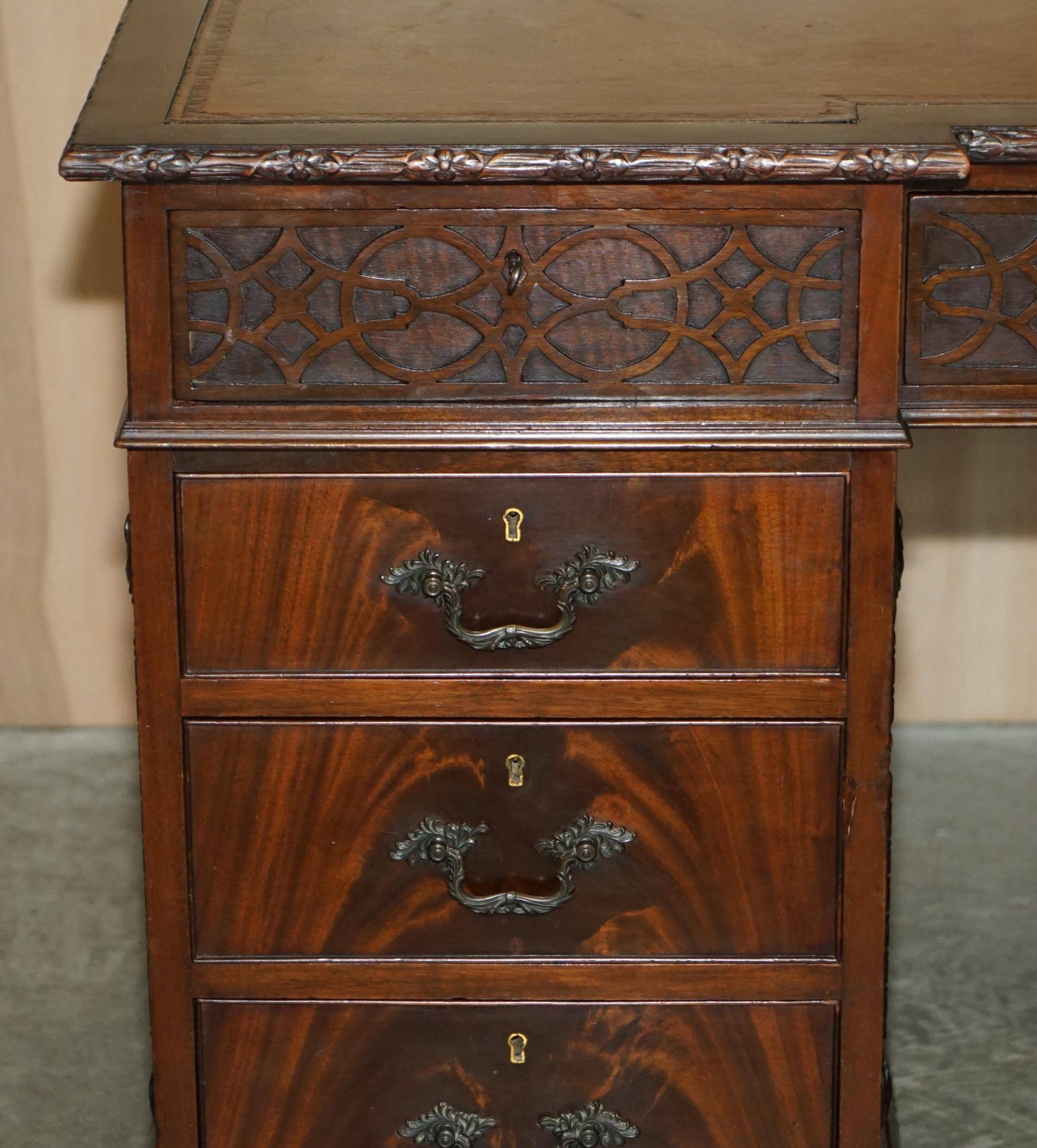 Thomas Chippendale Revival desk with a leather top