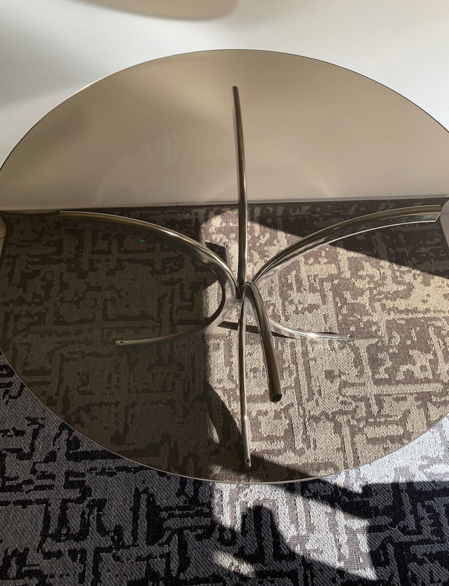 Round table in Italian smoked glass