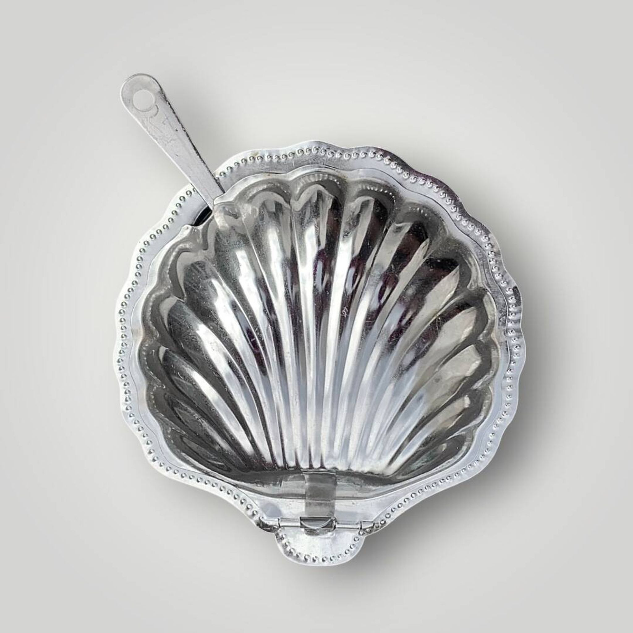 Vintage shell butter dish in stainless steel and cobalt blue glass with knife