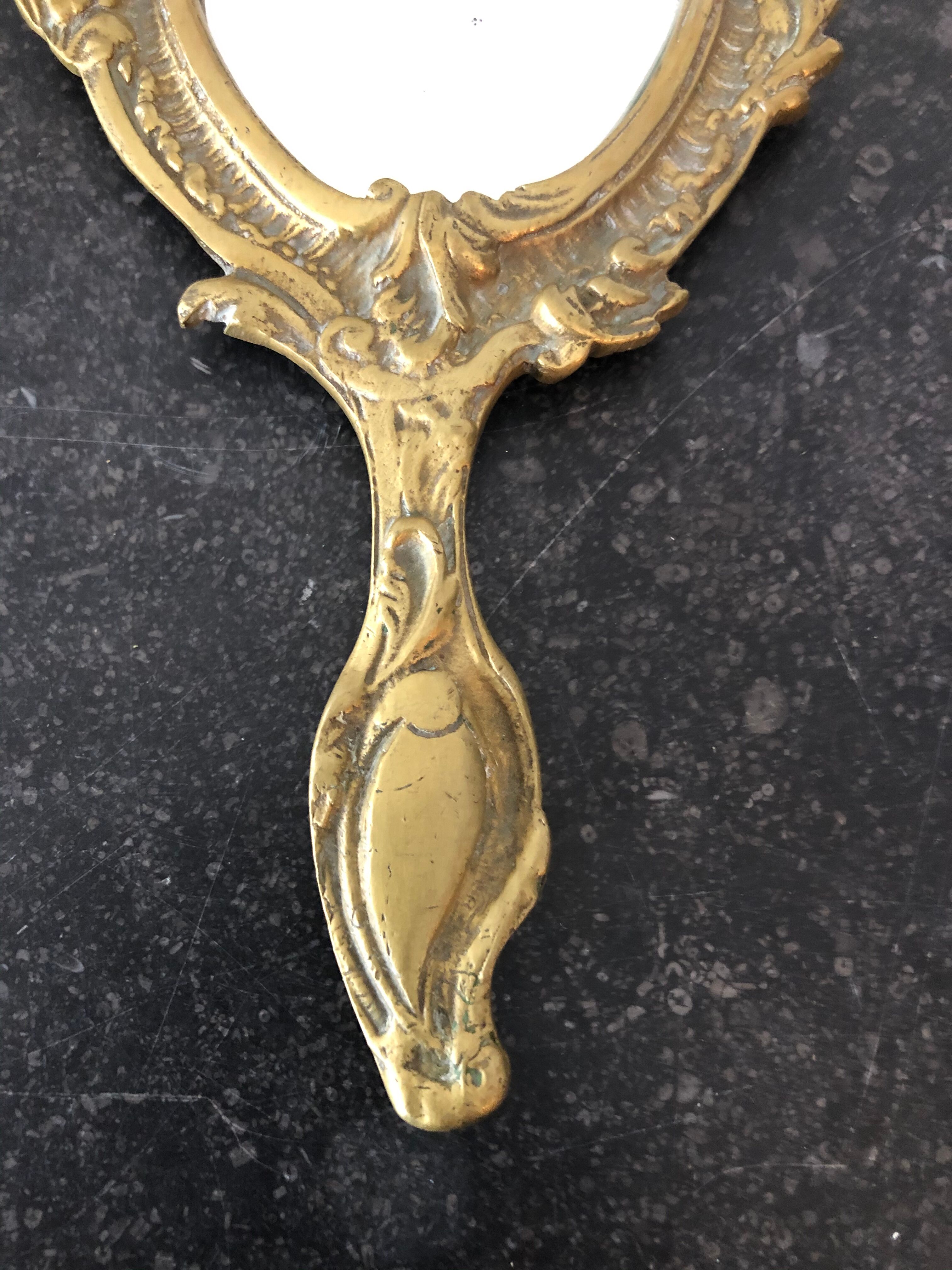 Brass hand mirror