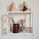 Vintage rattan and bamboo shelves painted white